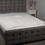 White electric heated blanket folded with integrated control switch