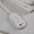 White quilted mattress protector corner close-up