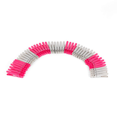 Pack of pink and grey plastic clothes pegs arranged in an arc, product image.
