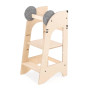 Dog-themed birch plywood learning tower with black ear and spots design