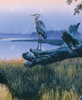 Close up of Bayou Beauty wooden jigsaw puzzle showing an evening scene of a crane standing on a fallen tree trunk as it over looks the bayou.