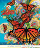 Close-up of Monarch Madness wooden jigsaw puzzle displaying a group of monarch butterflies perched on flowers and fluttering around. Some flowers are decorated with colorful paisley designs that stand out against the bright teal background.