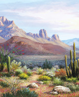  Close-up of Sonoran Sunset wooden jigsaw puzzle capturing a dry desert landscape where there are rocky mountains under the pastel colored sky. Cacti and wildflowers glow in the last bit of sunlight before night falls. 