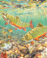  Close up of River Light wooden jigsaw puzzle, where two brook trout enjoy the sunlight shining down on them. One fish floats just above the rocks on the streambed, as the other fish spots a fishing lure and swims up towards it. 