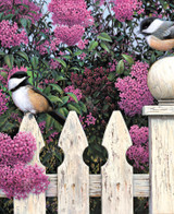  Close up of Love Song wooden jigsaw puzzle showing two chickadees sitting on a white fence in front of a vibrant pink lilac bush. One bird sits on the picket fence and looks back at the other bird that is sitting higher up on the post. Some of the lilacs form heart shapes from the blossoms. 