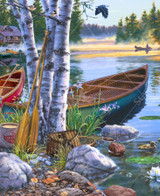  Close up of a lake puzzle featuring a tranquil scene of a lake surrounded by mountains and forests with canoes, paddles, and ducks. 
