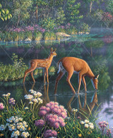  Close up of Drink It In wooden jigsaw puzzle exhibiting a pond landscape surrounded by vegetation and wild flowers. A deer and her two fawns are stopping to take a drink of water. 