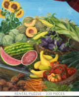  Close-up of Fresh From The Garden wooden jigsaw puzzle, revealing a wooden table displaying a variety of fruits and vegetables – corn, tomatoes, watermelon, cantaloupe,  eggplant, and many more. Sunflowers grow tall on the left side of the farmer's stand. 