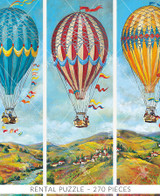  Close-up of Race Around The World wooden jigsaw puzzle featuring three panels, each  capturing a hot air balloon soaring in the bright blue sky over a town located on a mountainous landscape. 