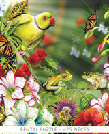  Close-up of Tropic Love wooden jigsaw puzzle revealing two frogs sitting together on a flower stem. A green parrot watches the two frogs as monarch butterflies flutter from flower to flower. Red poppies, clerodendrum ugandense, and lillies blossom around the the scene. 