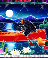  Close-up of Catching The Moon wooden jigsaw puzzle presenting a black bear paddling a red canoe around a lake with a fishing pole by its side. Two ducks swim along the boat as two pink fish jump out of the water among the lily pads. The moonlight glistens down on the water as it shines over the mountains. 