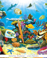  Close up of a colorful coral reef scene featuring tropical fish, a ray, and a shark swimming among vibrant corals in a sunlit underwater world. Rental - 210 Pieces 