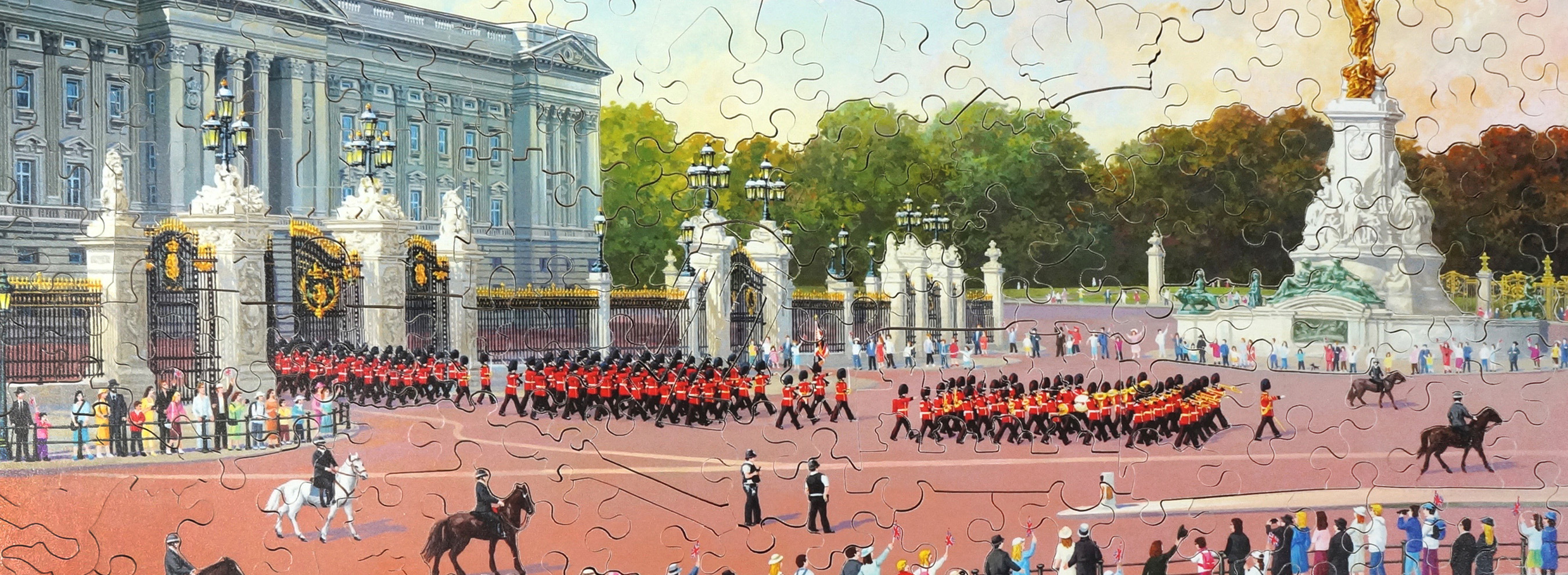Wooden landmark jigsaw puzzle depicting The King's Guard marching out of the gates at Buckingham Palace in London.
