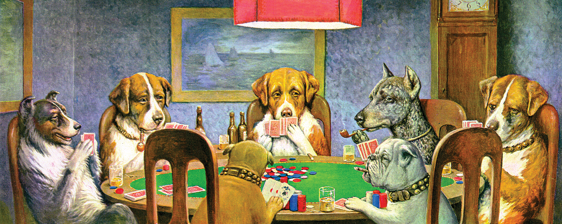 dogs sitting around table playing poker