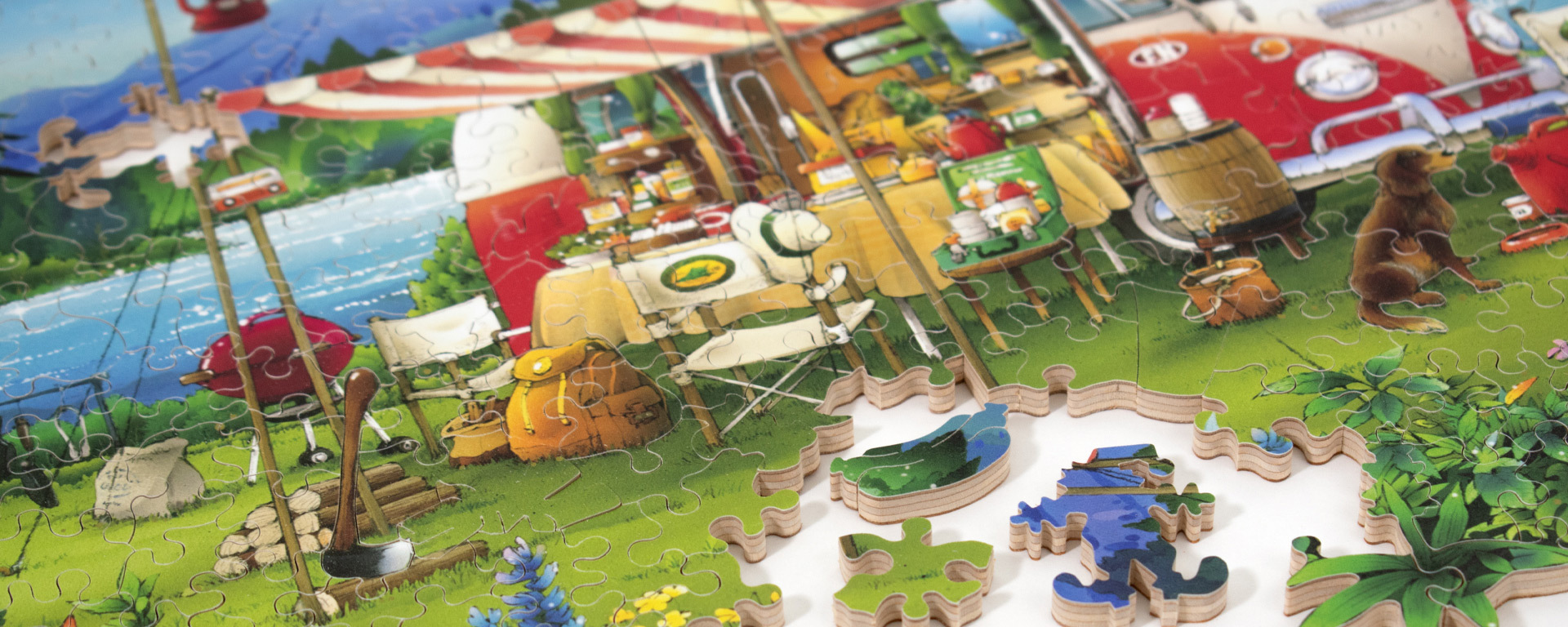 Wooden camping puzzle in progress featuring a VW van setup at a camping site