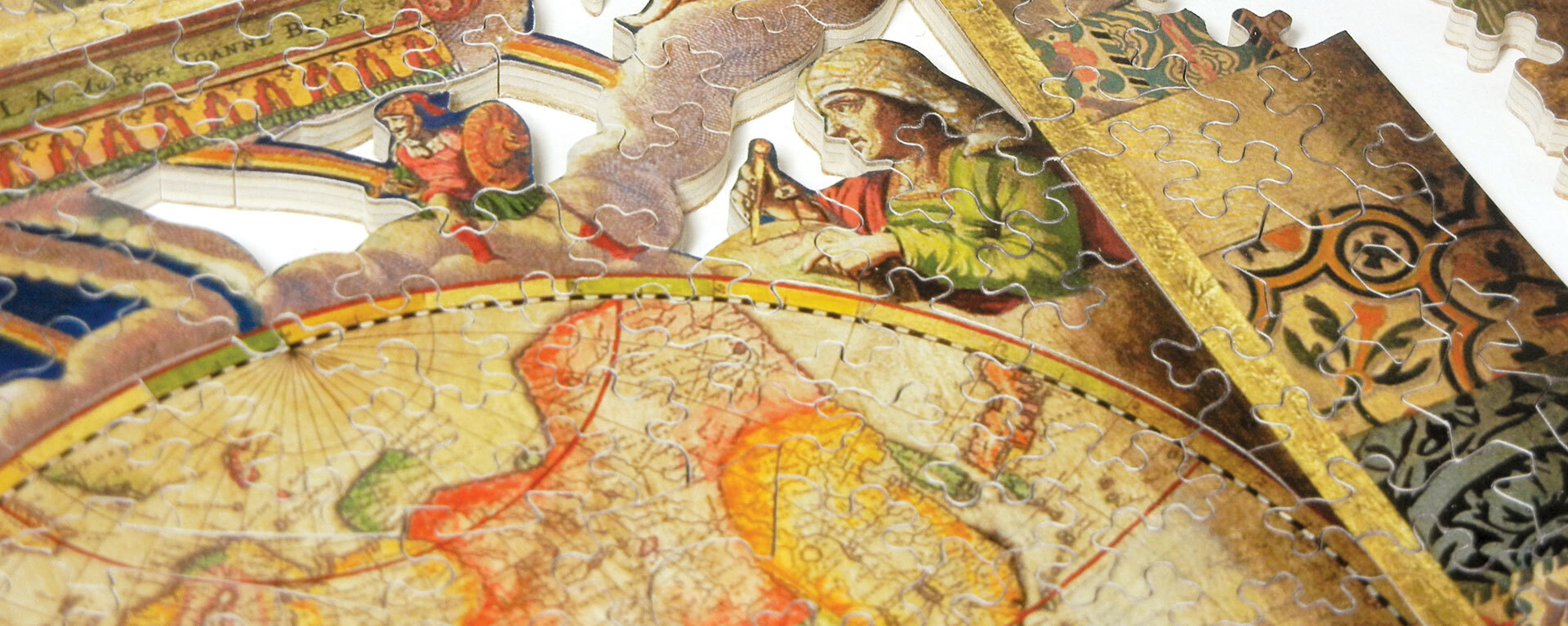 Wooden map puzzle featuring medieval people using a globe and a circular map in the foreground.