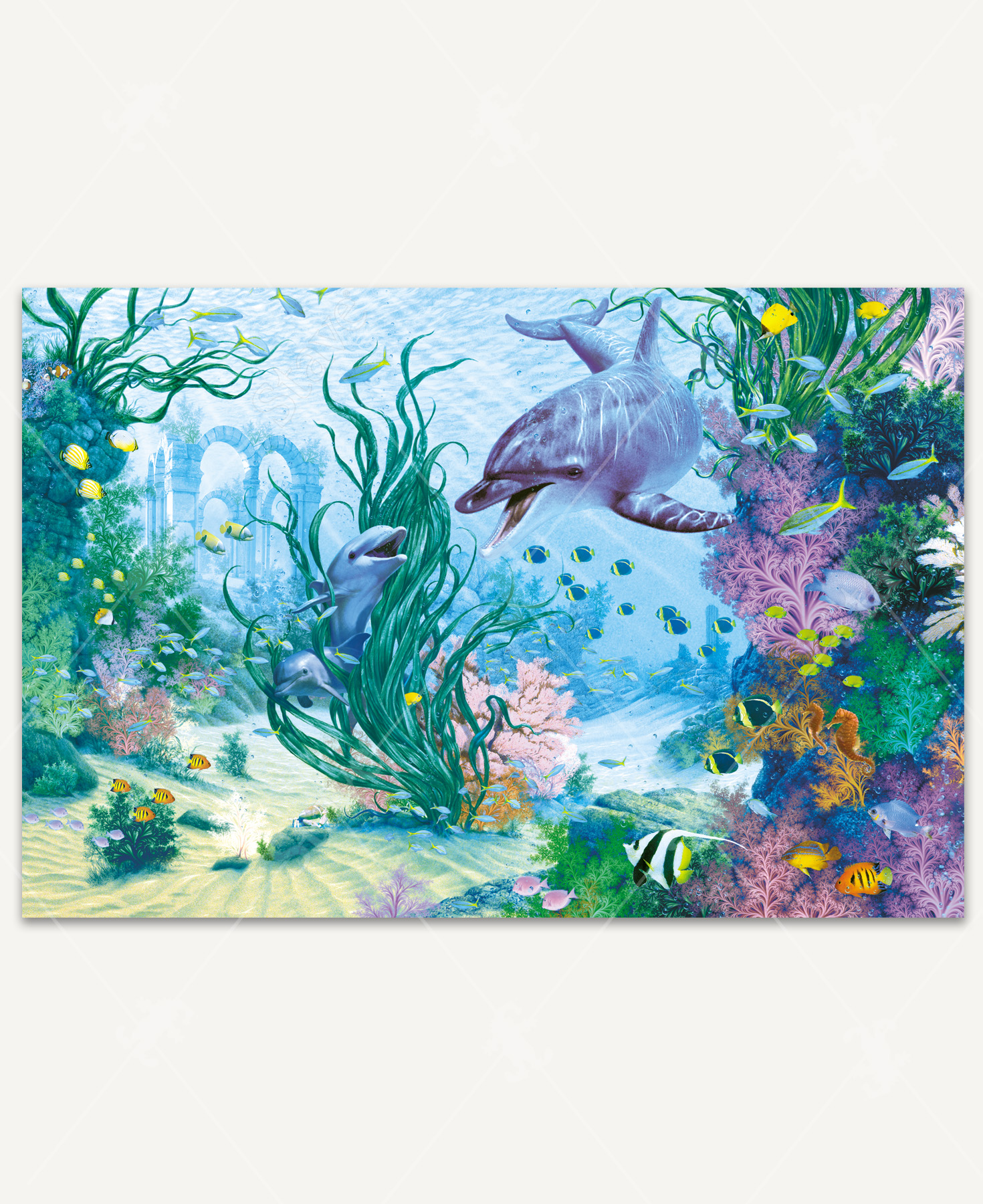 Playtime! wooden jigsaw puzzle transports viewers underwater with a dolphin and her two calves playing in between the seaweed and coral. A variety of fish and aquatic life swim around the family. Stone archway remains hide behind the vegetation off in the distance.
