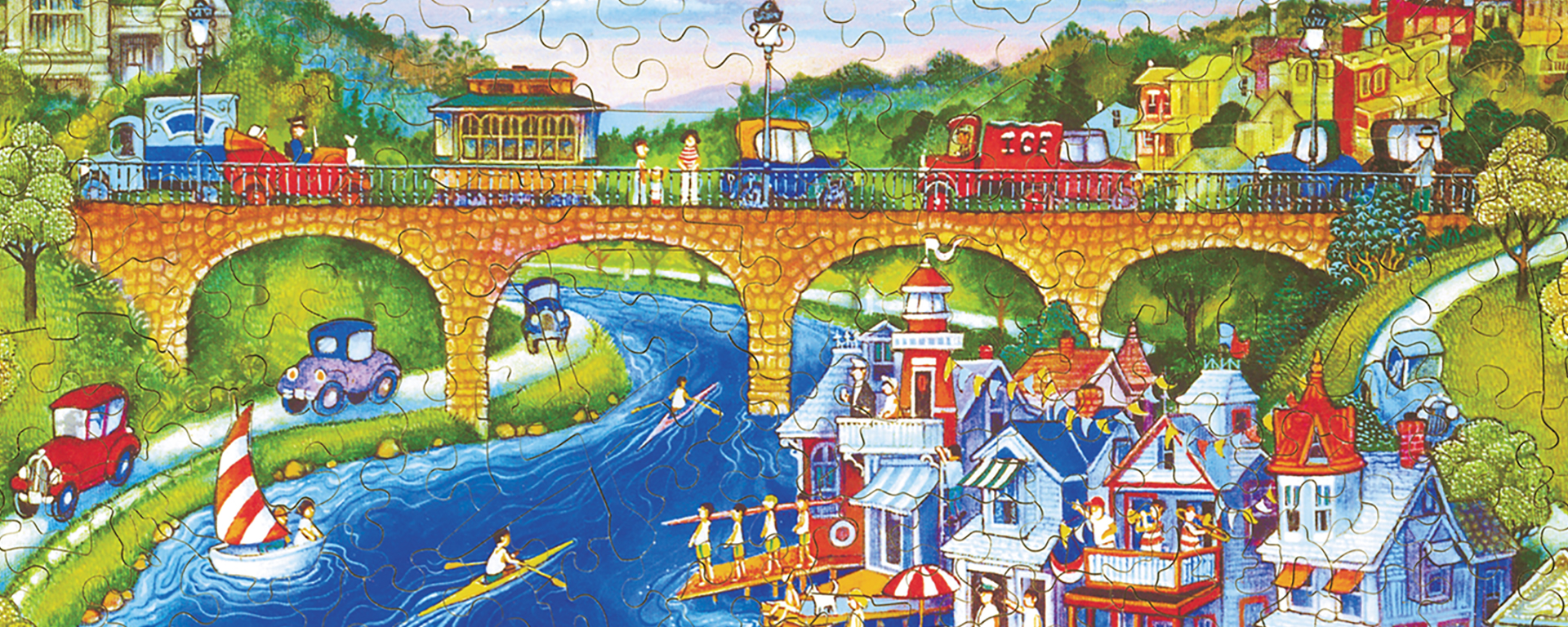 Wooden bridge jigsaw puzzle featuring an aerial view of a bridge crossing over a body of water with modern architecture surrounding the river.