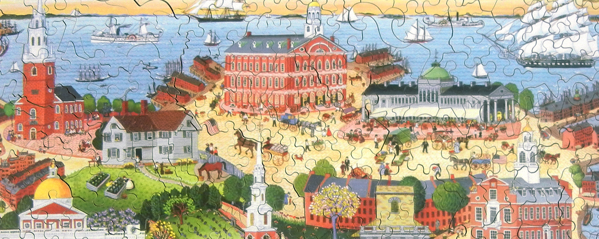 Wooden Boston puzzle featuring an overhead view of the city in the past when people used horse and buggies to get around.