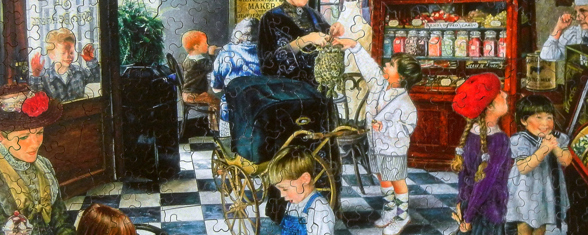 Wooden jigsaw puzzle depicting an old timey candy store filled with children with their mothers.