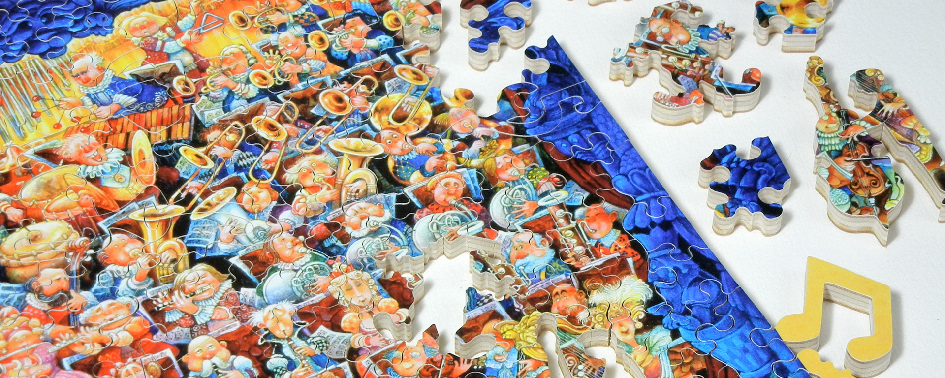 Wooden musician jigsaw puzzle in progress featuring a bunch of musicians playing a variety of instruments and whimsy shaped pieces of musical notes, violins, and the Stave logo.