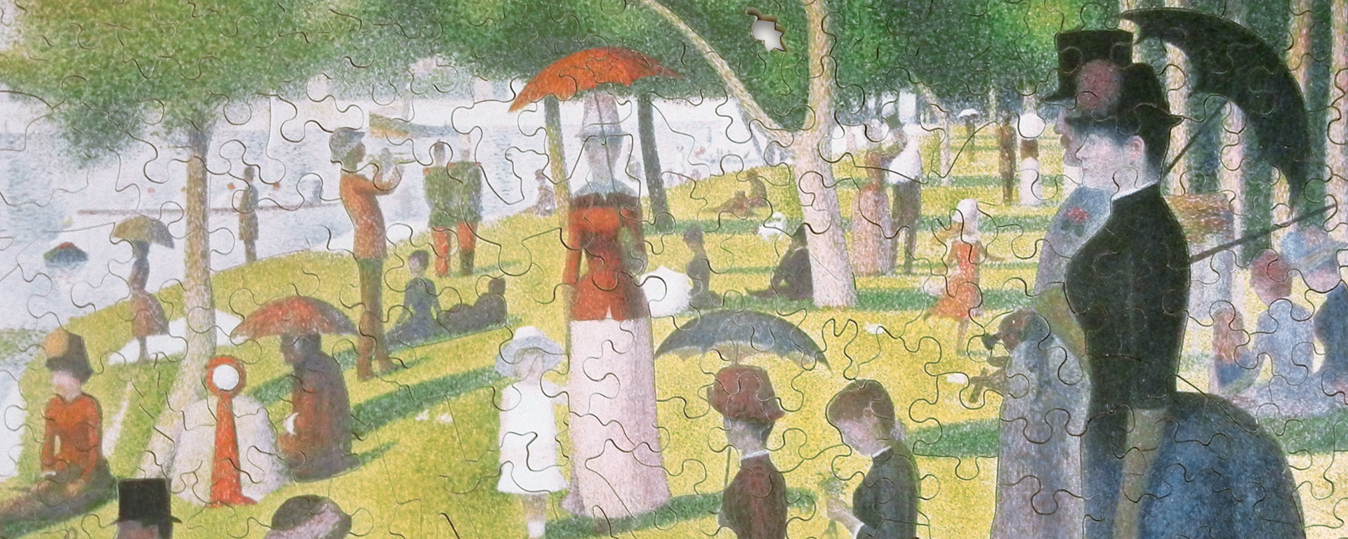 Wooden time period puzzle depicting the painting, A Sunday on La Grande Jatte by Georges Seurat.