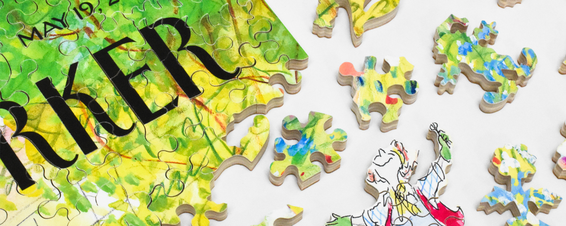 Wooden new yorker cover art puzzle in progress featuring a women with her arms outstreatched and wearing gardening gloves as well as colorful pieces in whimsical shapes such as flowers and the Stave logo.