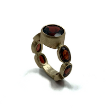 7 Red Garnets Set in 14k Gold Ring  7 Red Garnets Set in 14k Gold Ring