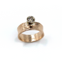 14K Rose Gold Ring With A Diamond Set In 14K White Gold