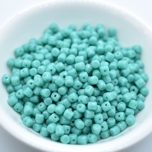 Minos Par Puca® 5 grams - Opaque Green Turquoise - 2.5x3mm Cylinder Czech Glass Beads