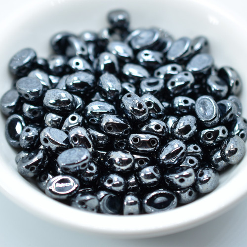 Samos® par Puca® (20 beads) 2-Hole 7x5mm Oval - Jet Hematite