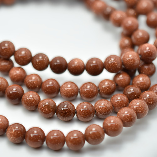 8mm Smooth Round Goldstone, 15.5 inch strand