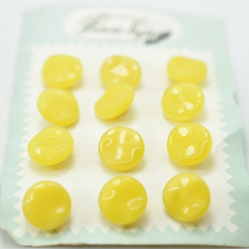 12 Buttons- 14mm Carded Wavy Silky Lemon, Glass Shank - Czech Glass