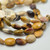 10x14mm Faceted Oval Mookaite, 15.5 Inch Strand of Beads