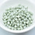 Kalos® par Puca® (50 beads) 2-Hole 4x3mm Drum Shape - Opaque Light Green Ceramic Look - Czech Glass