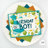 Handmade greeting card with party hat on it and wish big, birthday boy sentiment on it.