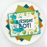 Handmade greeting card with party hat on it and make a wish, birthday boy sentiment on it.