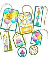 Handmade greeting tags with balloons, cake, and party hats on each.