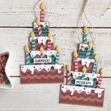 Two handmade greeting tags with birthday cakes on each and candles with different birthday sentiments on it.