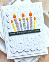 Handmade greeting card with candles on it and happy birthday, hot stuff sentiment on it.