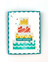 Handmade greeting card with cake on it and and happy birthday sentiment on it.