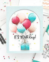 Handmade greeting card with balloons on it and it's your day sentiment on it.
