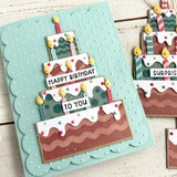Handmade greeting card with cake on it and happy birthday to you sentiment on it.