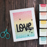 Handmade greeting card with flowers on it love you more sentiment on it.