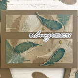 Handmade greeting card with feathers on it and in loving memory sentiment on it.