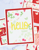 Handmade greeting card with flowers on it and hello friend sentiment on it.
