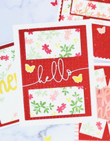 Handmade greeting card with flowers on it and hello sentiment on it.
