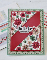 Handmade greeting card with flowers on it and a butterflies and birthday wishes sentiment on it.