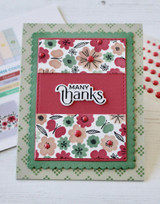 Handmade greeting card with flowers on it and a butterflies and many thanks sentiment on it.