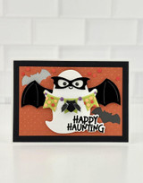 Handmade greeting card with ghost on it with glasses and happy haunting sentiment on it.
